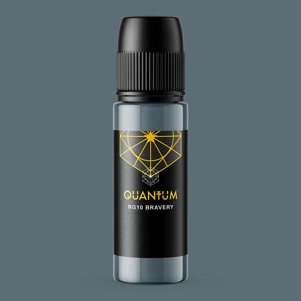 Bottle with black cap and 'Quantum' branding on a gray background