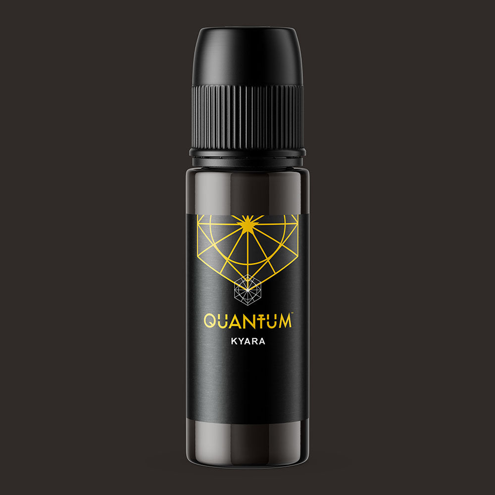 Black bottle with 'Quantum Kyara' label on a dark background