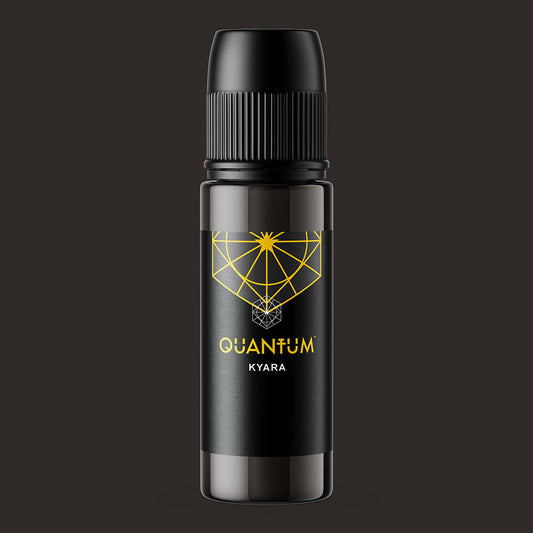 Black bottle with 'Quantum Kyara' label on a dark background